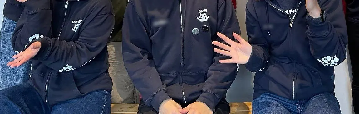 Expo House staff in team hoodies
