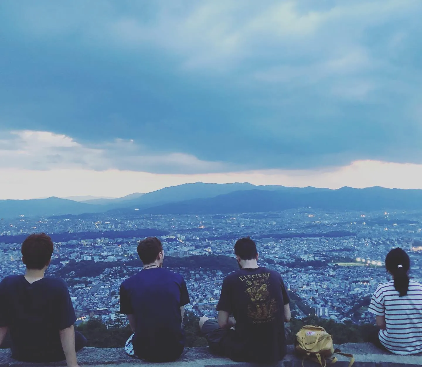 Housemates watching Kyoto at dusk