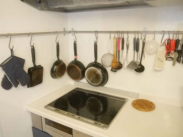 Pans and cooking tools ready to use in the Tate kitchen